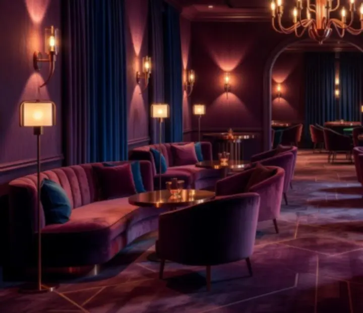 Atmospheric lighting over casino-style tables in an elegant restaurant